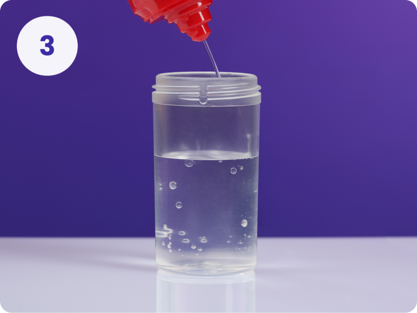 Number 3 - contact lens solution squirting from bottle with red lid into case, filling up case